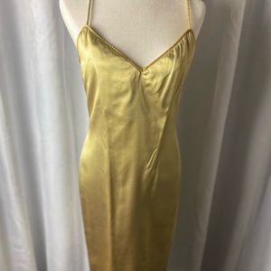 JOAN RAINES gold slip dress.